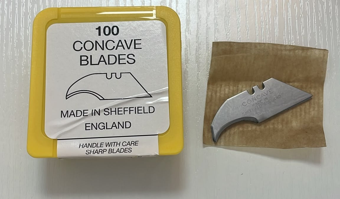 Tub of 100 concave trimming blades made in Sheffield England