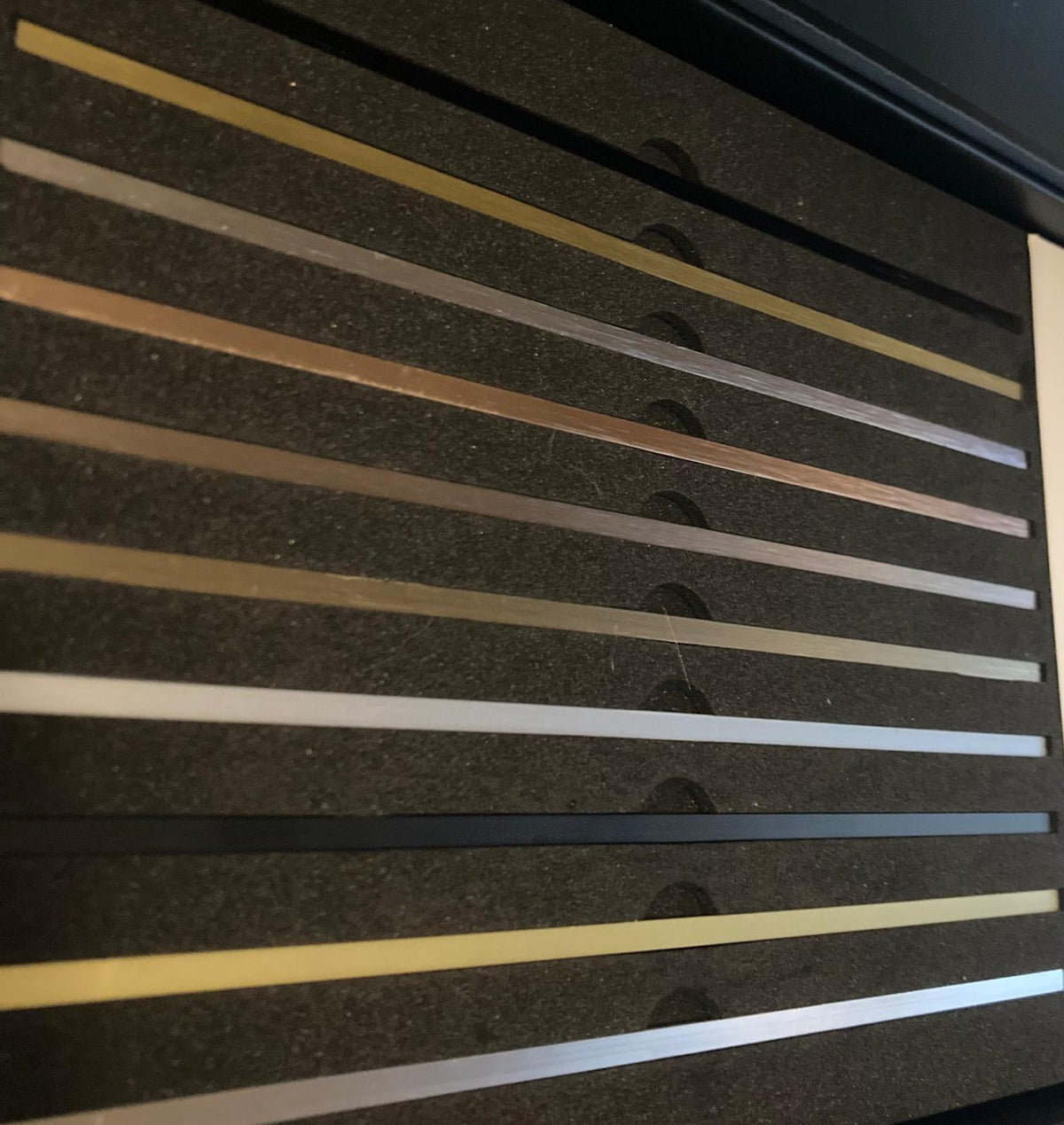 Hagley metal LVT inlay strip finish selection in sample case